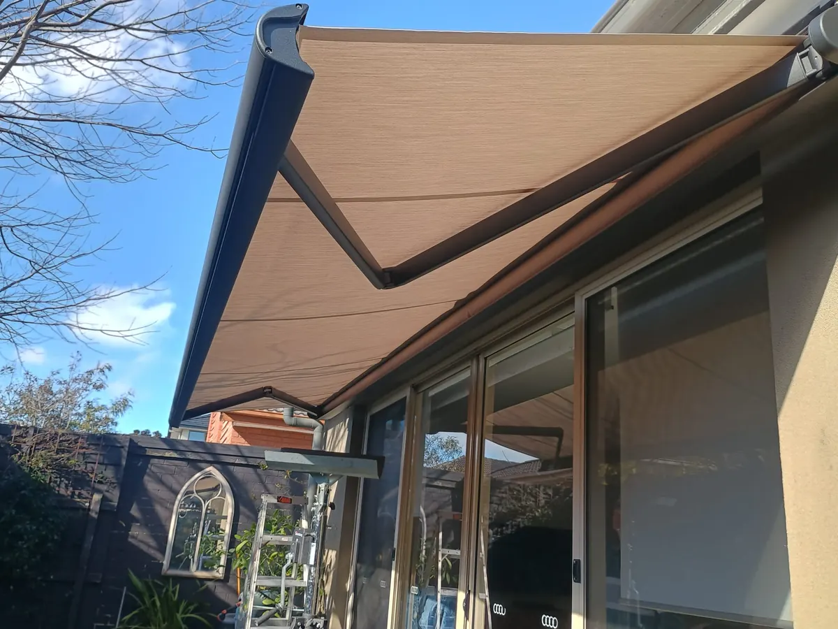 Folding arm awning shading a residential patio, Melbourne
