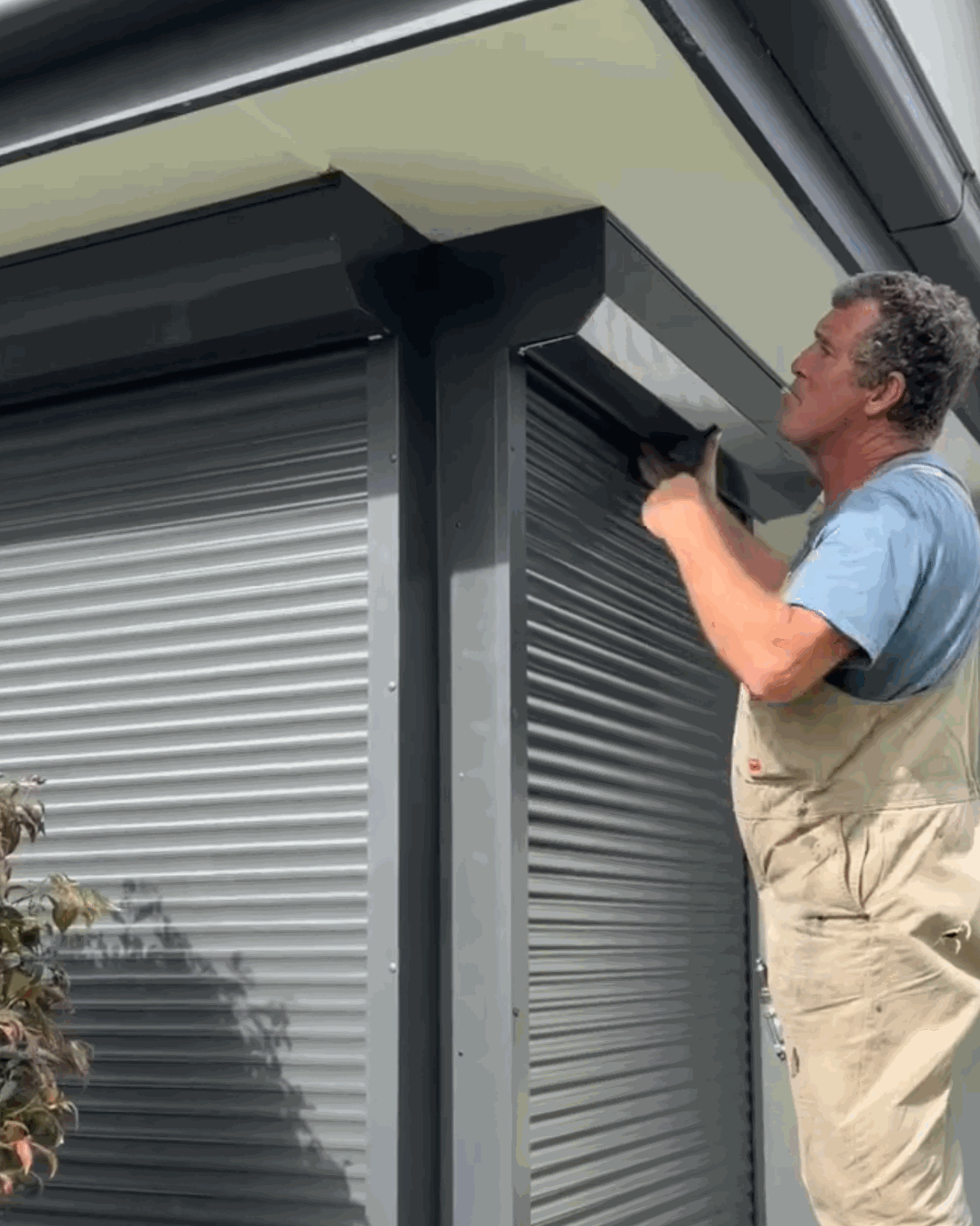 chris-installing-roller-shutter-residential-melbourne